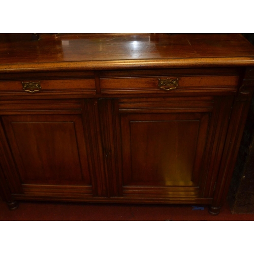 161 - VICTORIAN SCOTTISH DRESSER in mahogany with two drawers over two large cupboards and an ornately car... 