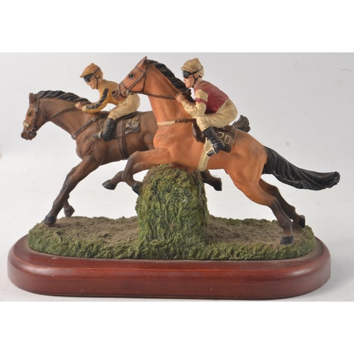 18W - Two horse themed figurines, no names on bases, one a hunting scene, the other a horse racing theme, ... 