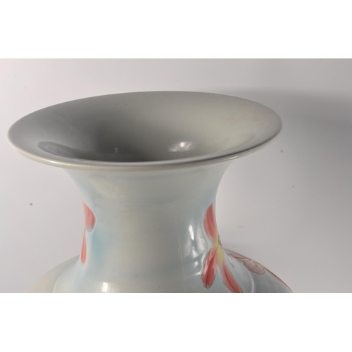 18Y - Very large ORIENTAL Feature inspired vase with floral decoration in a blueish Background