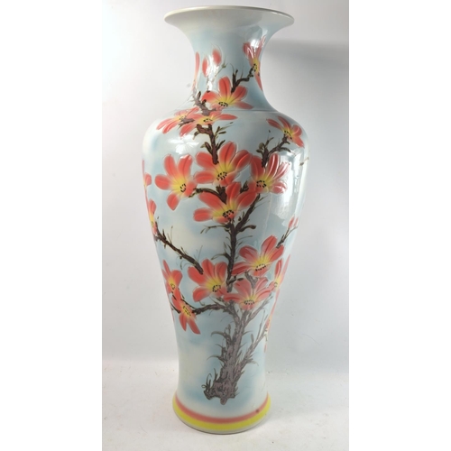 18Y - Very large ORIENTAL Feature inspired vase with floral decoration in a blueish Background