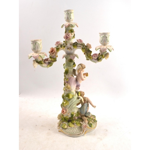 24K - C late 19th century East German VON SCHIERHOLZ GERMAN PORCELAIN CHERUB FIGURAL CANDELABRA with flora... 