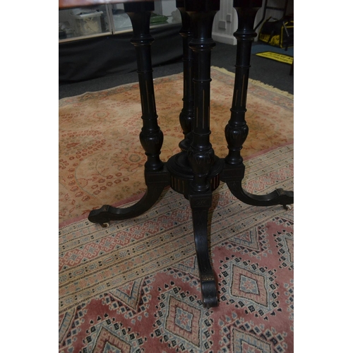 25 - EXCEPTIONAL QUALITY! VICTORIAN OCTAGONAL EBONY & WALNUT inlay table, with a brass bead edge standing... 