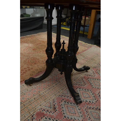 25 - EXCEPTIONAL QUALITY! VICTORIAN OCTAGONAL EBONY & WALNUT inlay table, with a brass bead edge standing... 