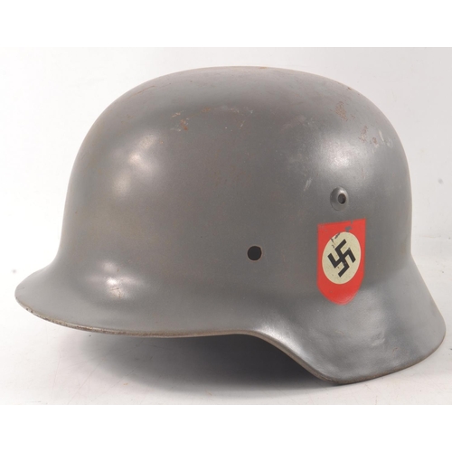 31A - A modern reproduction German Waffen SS 2nd Model helmet