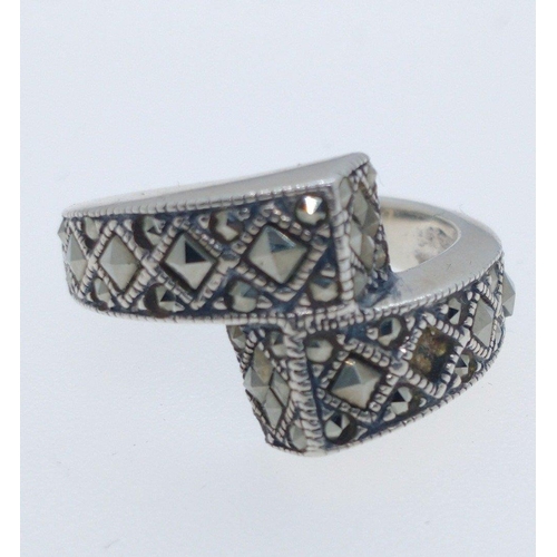 18 - 925 stamped silver ring set with square cut marcasite. Size N, one setting missing. Comes with ring ... 