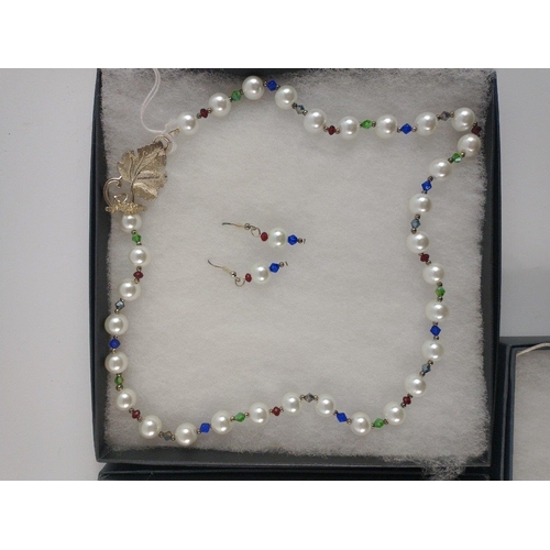 27 - Selection of COSTUME JEWELLERY.  1 white metal necklace with green stones and matching earrings,  1 ... 