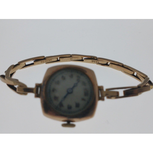 8A - A 375 stamped yellow gold watch casing ladies vintage watch with a REGENT expanding strap stamped '9... 