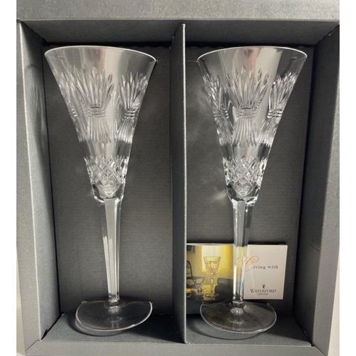 211 - WATERFORD CRYSTAL THE MILLENNIUM COLLECTION TWO LARGE CHAMPAGNE FLUTES in original gifting box. Engr... 