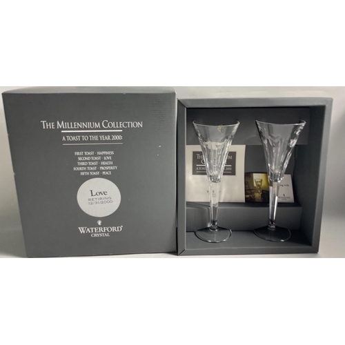 214 - WATERFORD CRYSTAL THE MILLENNIUM COLLECTION TWO LARGE CHAMPAGNE FLUTES in original gifting box. Engr... 