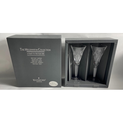 215 - WATERFORD CRYSTAL THE MILLENNIUM COLLECTION TWO LARGE CHAMPAGNE FLUTES in original gifting box. Engr... 