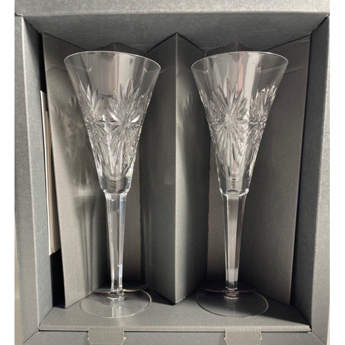 215 - WATERFORD CRYSTAL THE MILLENNIUM COLLECTION TWO LARGE CHAMPAGNE FLUTES in original gifting box. Engr... 