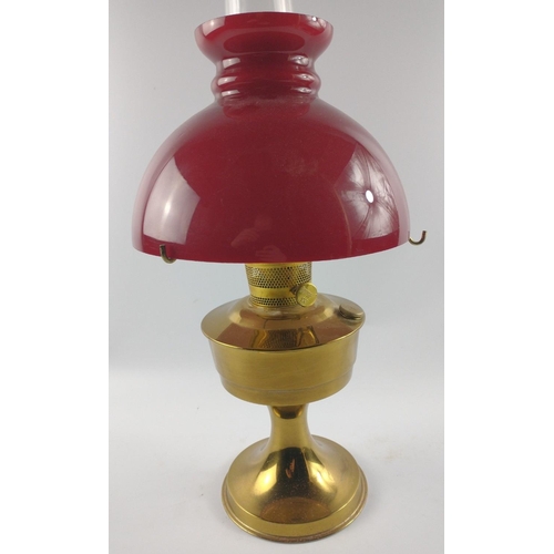 226 - Oil lamp with vibrant red shade.  Stands 60cm tall.#283