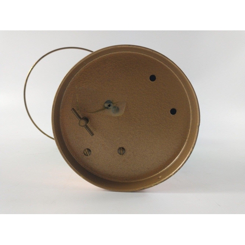 229 - A VINTAGE copper framed green-bottle lantern style lamp with carry handle and wind up MUSICAL base#2... 