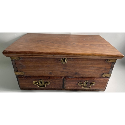 234 - A PEARL MERCHANTS BOX FROM OMAN made from local hardwood with solid brass fittings, two drawers and ... 