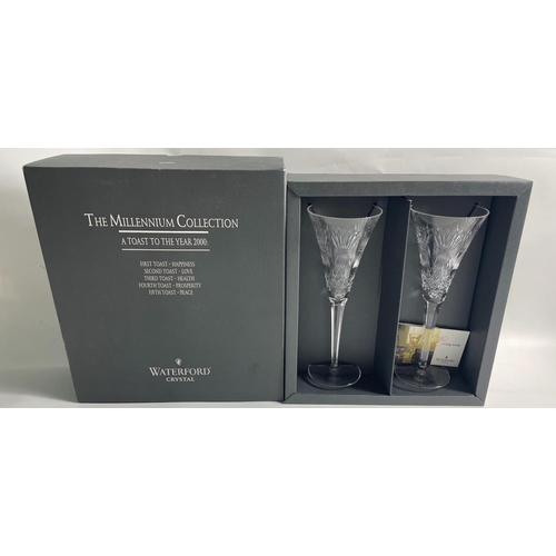 211 - WATERFORD CRYSTAL THE MILLENNIUM COLLECTION TWO LARGE CHAMPAGNE FLUTES in original gifting box. Engr... 