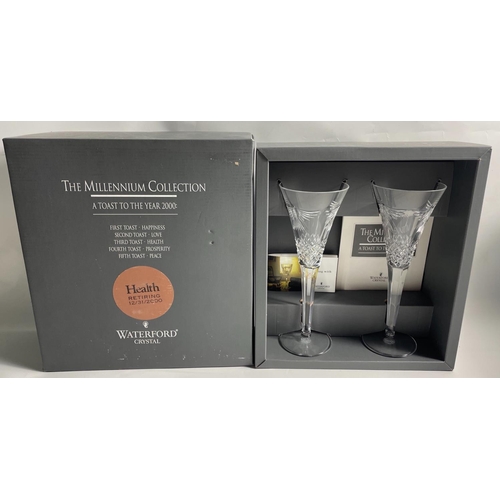 213 - WATERFORD CRYSTAL THE MILLENNIUM COLLECTION TWO LARGE CHAMPAGNE FLUTES in original gifting box. Engr... 