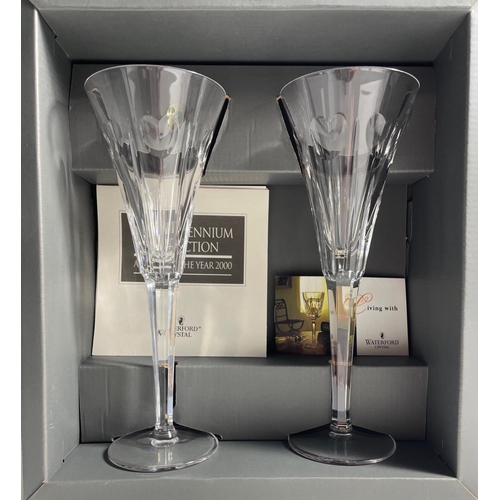 214 - WATERFORD CRYSTAL THE MILLENNIUM COLLECTION TWO LARGE CHAMPAGNE FLUTES in original gifting box. Engr... 