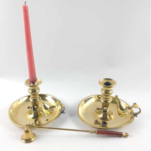 223 - Pair of brass Wee Willie Winkie candle sticks and a brass candle snuffer with wooden handle#268