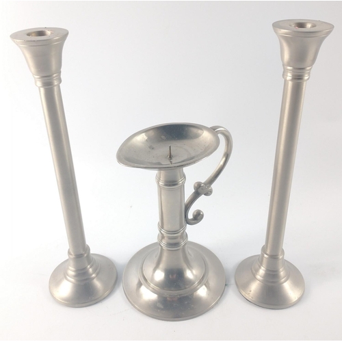 223B - One pair of metal candlesticks approx. 30cm tall plus one Indian made candlestick approx. 19cm high.... 