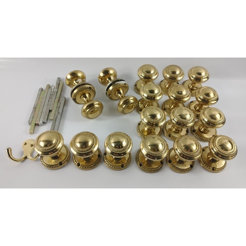 224 - Nine pairs of modern brass door knobs plus 10 spindles - 6 x 11cm approx, 2 x 12cm approx. and 2 x 1... 