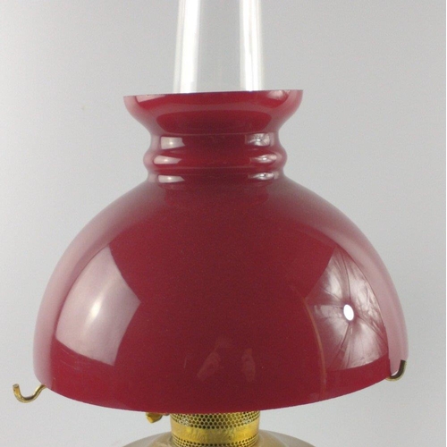 226 - Oil lamp with vibrant red shade.  Stands 60cm tall.#283