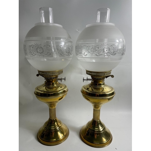 230A - A pair of rather handsome vintage OIL LAMPS standing almost 55cm high, complete with patterned shade... 