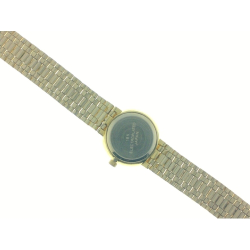 24 - An OMEGA STYLE ladies wrist watch stamped '18k electro plated Japan' with a stamped stainless steel ... 