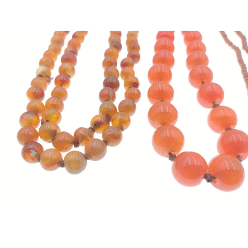 55 - Small string of VINTAGE coral beads and 2 coral coloured strings of beads#56