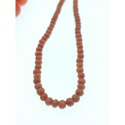 55 - Small string of VINTAGE coral beads and 2 coral coloured strings of beads#56