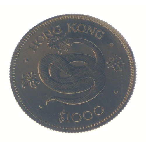 6 - A 1977 HONG KONG $1000 Lunar Year Coin 'The Year Of The Snake' struck in 22ct yellow gold within its... 
