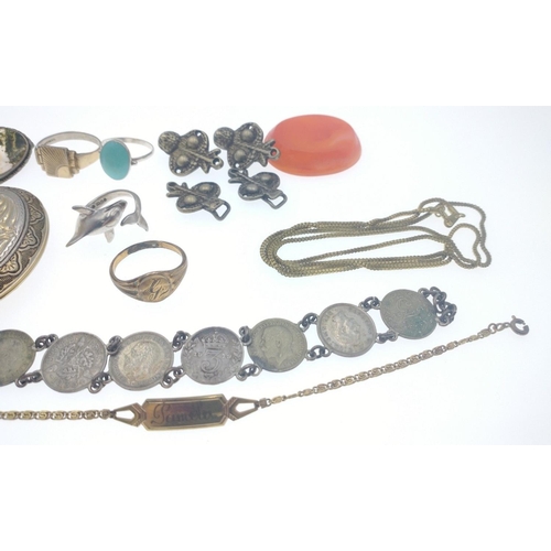 29 - Mixed lot to include 3 rings, oval metal locket, brooch and a silver three pence bracelet [15.3grm] ... 