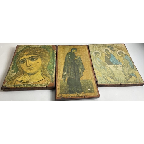 375 - Three wooden plaques of RELIGIOUS FIGURES in the Greek Orthodox style. Two measure 26 x 33cm, the ot... 