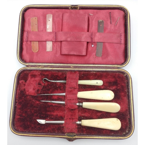 387 - For the travelling lady of yore - a combined MANICURE/SEWING KIT lined in red velvet#432