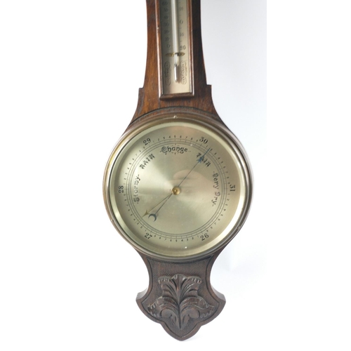 58 - A SUPERB EXAMPLE!! A large VINTAGE OAK CARVED WALL HANGING BAROMETER including thermometer 80cm heig... 