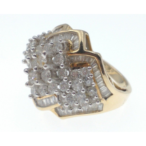 7 - 14K Yellow Gold Large Diamond set cluster ring. set with round and baguet cut stones. approx 2.5ct  ... 