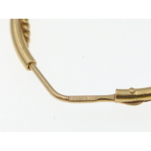 18 - Two pairs of hoop earrings one 750 stamped(faint stamp) purchased in Saudi Arabia, weight 6.5g appro... 