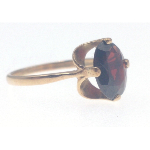 3 - A nice 375 stamped yellow gold ring size M with large OVAL GARNET set stone(1cm length) weight gross... 