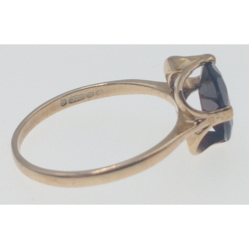 3 - A nice 375 stamped yellow gold ring size M with large OVAL GARNET set stone(1cm length) weight gross... 
