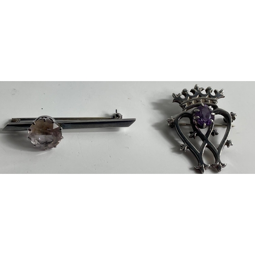 113 - Two hallmarked brooches, the one is a LUCKENBOOTH style with amethyst coloured stone 4cm long gross ... 