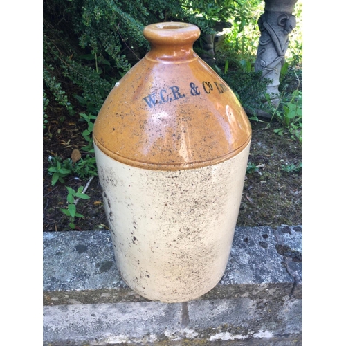 69 - An ANTIQUE STONEWARE large flagon with WCR & Co Ltd dimension 43cm tall stamped on the shoulder#70... 