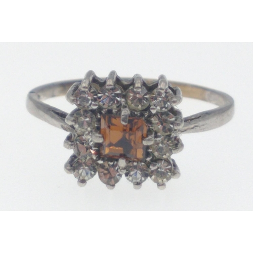 10 - 9ct and silver stamped white metal ladies square set ring with an orange square stone surrounded by ... 