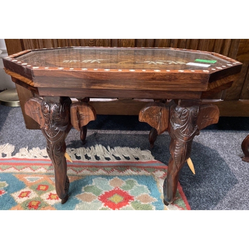 173 - An INDIAN Octagonal hand carved and inlaid small table with elephants in the forest scenes dimension... 