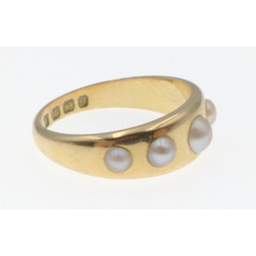 2 - An 18ct stamped Birmingham yellow gold ladies dress ring with five pearls inset gross weight 4.92g a... 