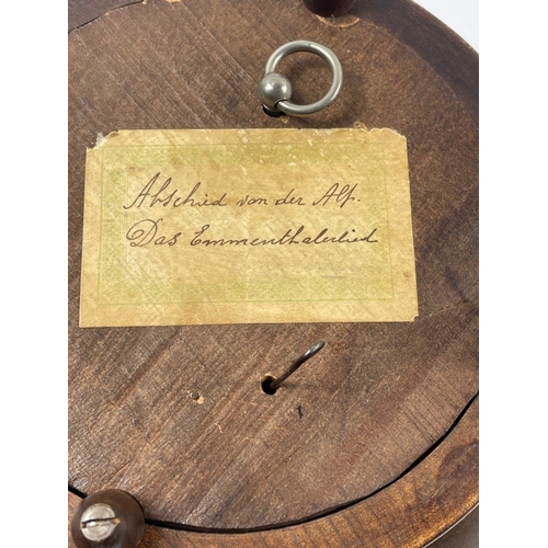 211 - A MUSICAL GERMAN CARVED WOODEN BOWL C1930's 24cm diameter and 12cm depth(Musical movement requires s... 