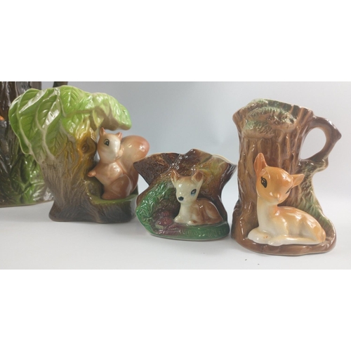 257 - A collection of WITHERNSEA EASTGATE FAUNA POTTER and a crack at the lip), a plantpot holder (approx ... 