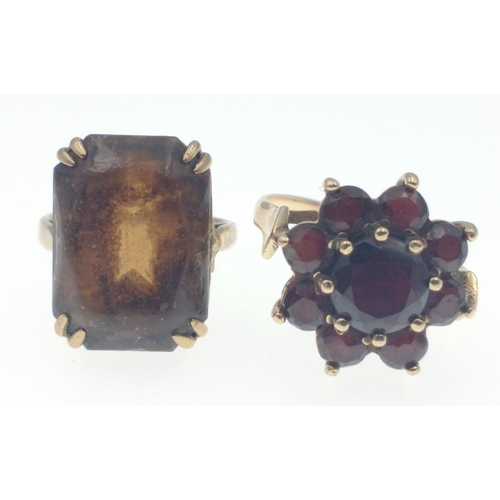 30D - Two 375 stamped yellow gold VINTAGE ladies rings, one with a large red garnet, and surrounding small... 