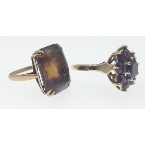 30D - Two 375 stamped yellow gold VINTAGE ladies rings, one with a large red garnet, and surrounding small... 