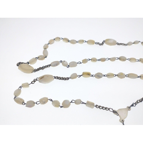 30F - A VINTAGE USA made set of Mother Of Pearl ROSARY BEADS with a yellow metal crucifix 36cm length (dou... 