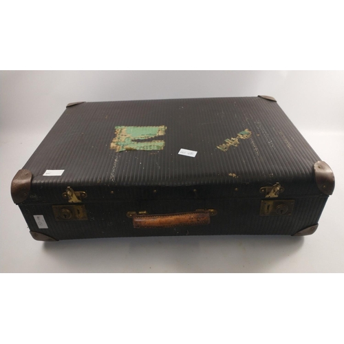 333 - A vintage suitcase 25 x 17 x 19cm to include contents of vintage football programmes and Scottish fo... 