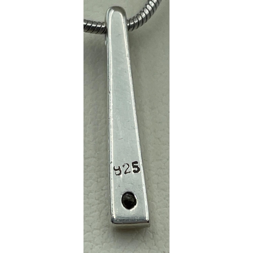 39 - Two 925 stamped DAVID CHRISTOPHER pendants one wedged shaped, chain length 40cm gross weight 6.97g, ... 